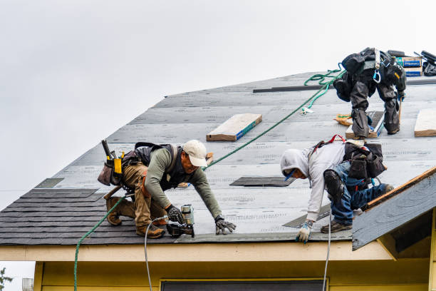 Professional Gutter Installation technician working in Miami, IN